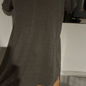 #Tahari size s, Not tucked in top, never worn no tags.